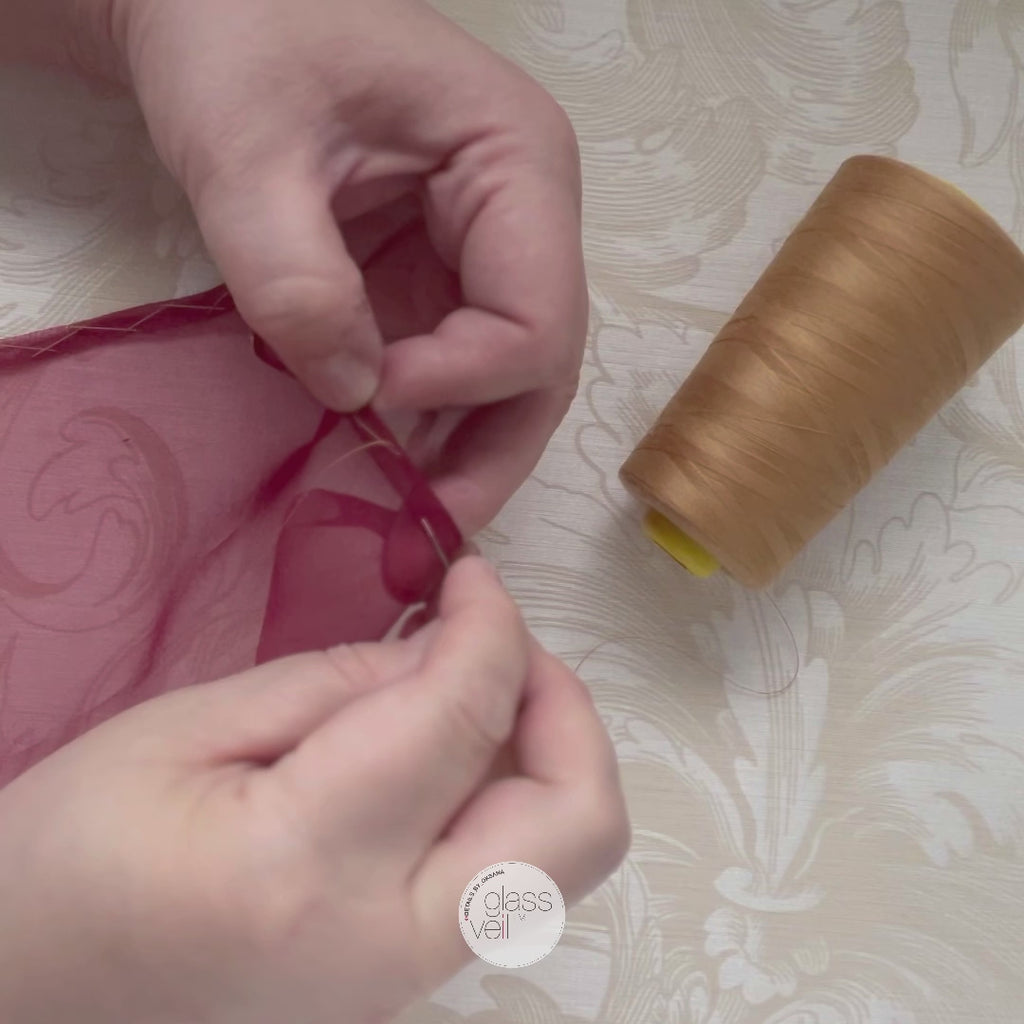 showing the process of hand stitching mulberry silk and how herringbone stitch improves strength of hypoallergenic gift